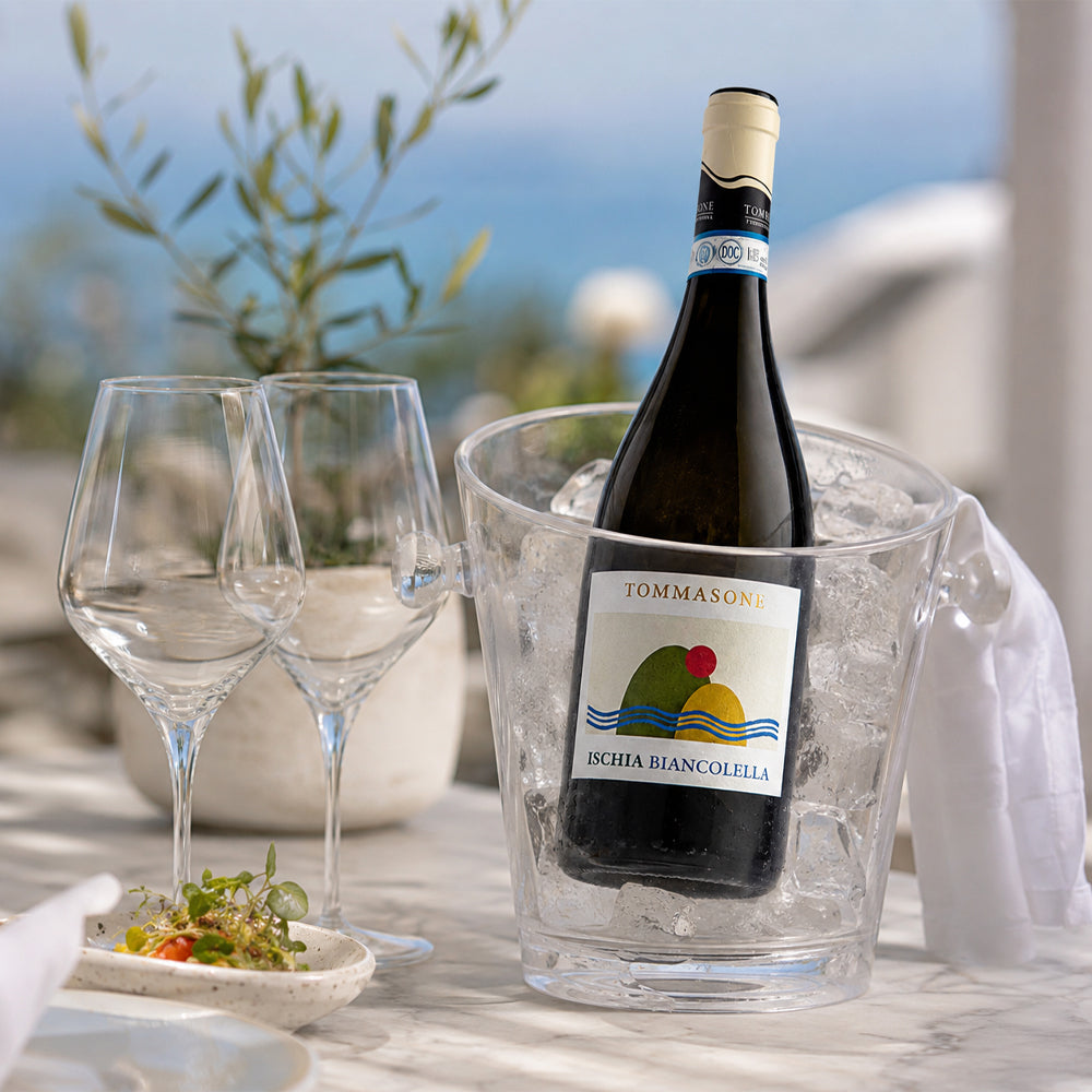 White wine served chilled in summer with glasses and accessories