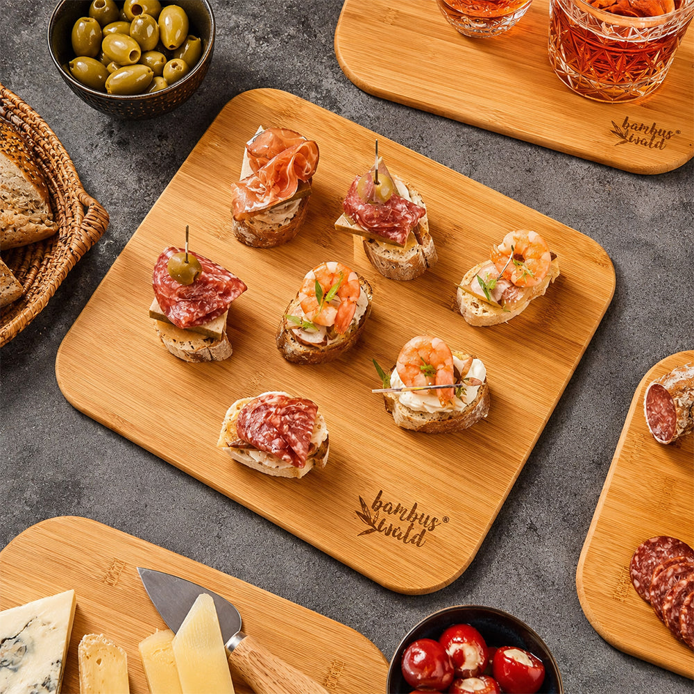 Serving trays with finger food and appetisers for an apericena at home